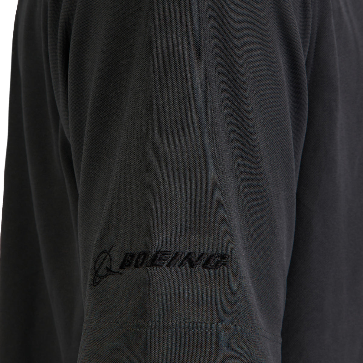 Nike Boeing Phantom Works Men's Dri-Fit Polo in Anthracite with Boeing Logo Close-up