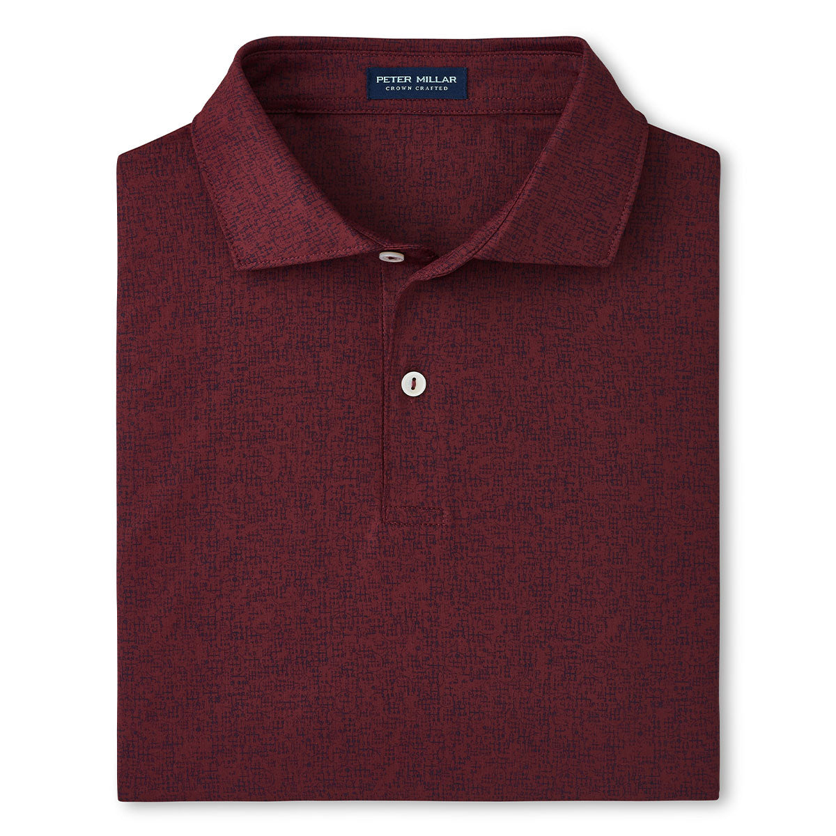 Product image of the polo folded in a square shape.  Polo is in a vermouth color and features 2 placket buttons.