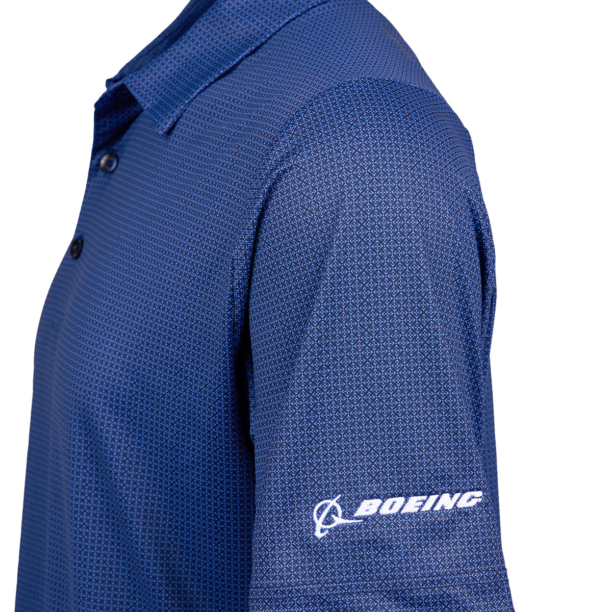 Close up of white Boeing logo embroidered  on left sleeve.