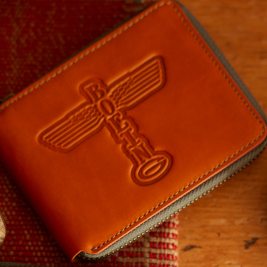 lifestyle image of the wallet laying on top of a table.