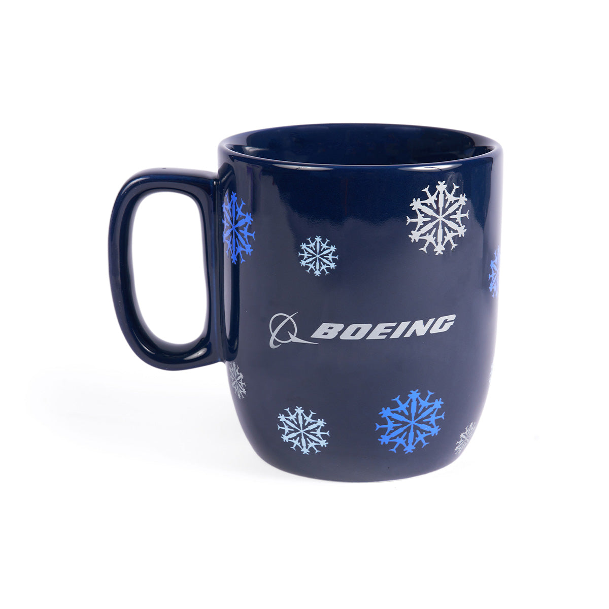 Product image of the mug in navy color.  Silver Boeing logo in the center of one side.  All over print of the Jet Snowflake graphic. Mug features a C-handle.